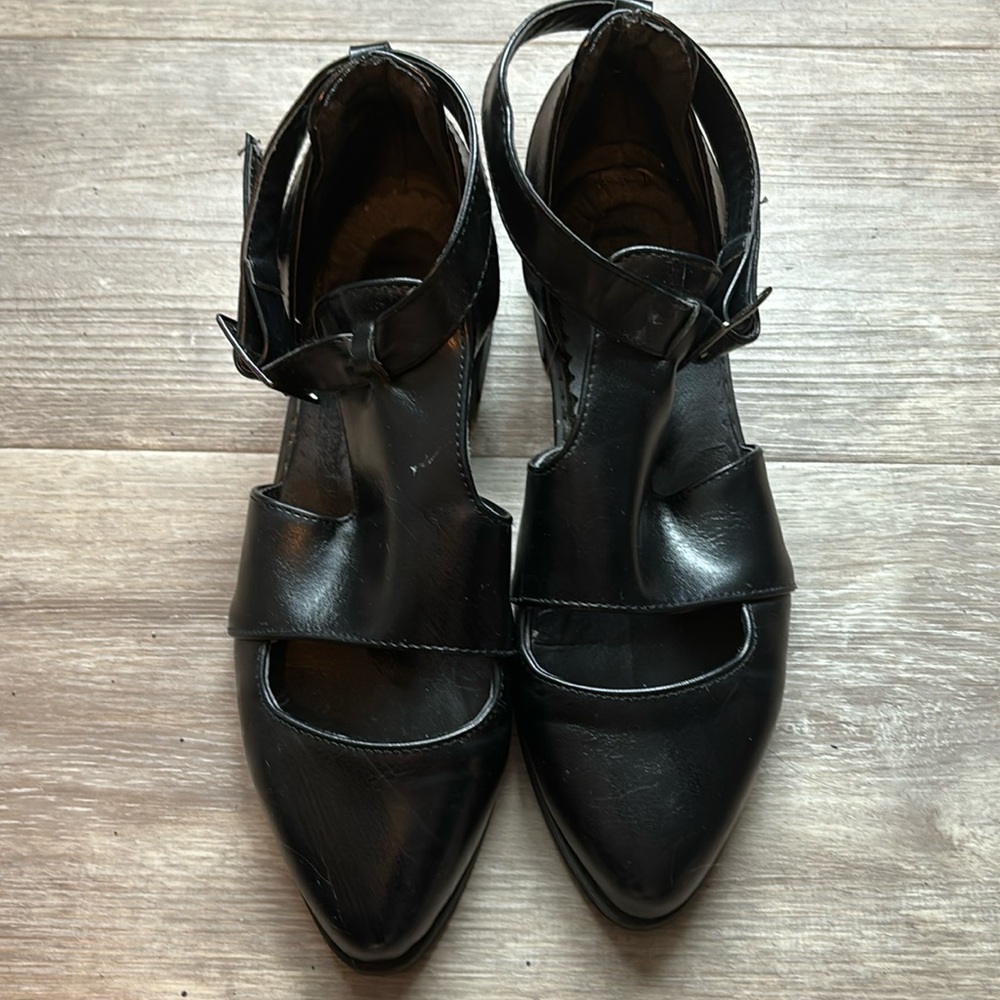 Strappy buckle flats with cut out toe and sides